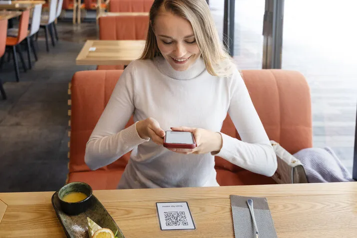 Customer scanning QR code
