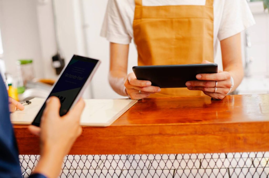 Mobile POS system processing a digital payment at checkout
