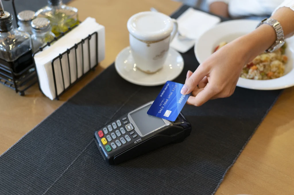 person-paying-with-its-credit-card