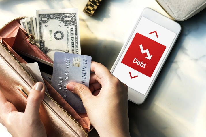Credit card and mobile wallet illustrating credit card processing costs