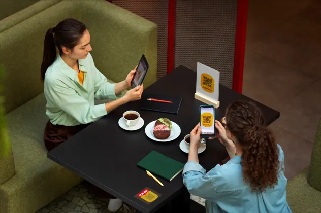 Customers using QR code digital payment system
