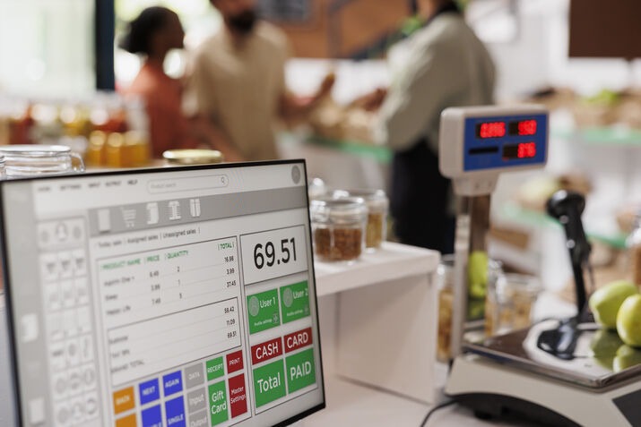 Restaurant POS system processing a customer payment at checkout.