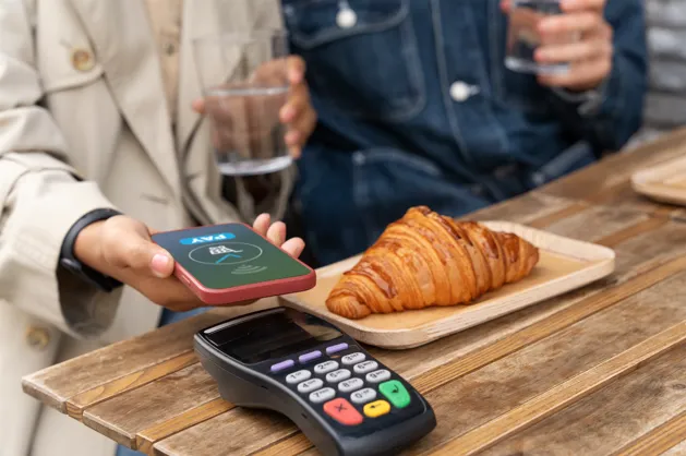 Contactless payment at café POS terminal
