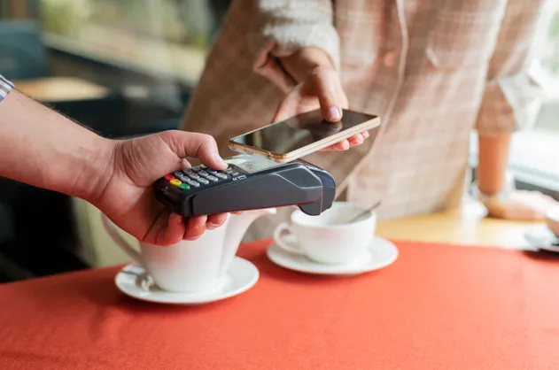 Customer making contactless mobile payment